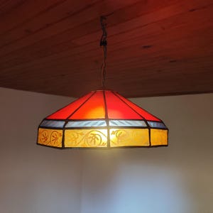Engraved and painted pendant lamp