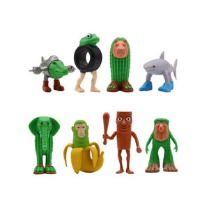 May include: A collection of whimsical figurines, each with a unique design. The set includes a green elephant, a monkey in a banana, a frog on a tire, a shark, and other quirky characters. The figurines are brightly colored and made of plastic.