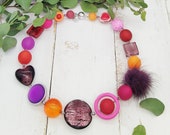 extravagante Kette mit Puschel, Glasherz und Muranoglas