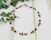 elegante Kette mit Korallenstäbchen und Perlmutt