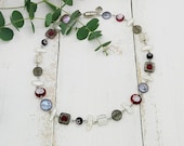 elegante Kette im Materialmix Perlen in grau/ weiß/ rot/ schwarz
