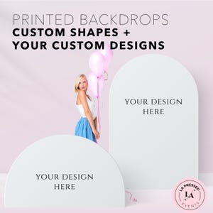 May include: Two white arch-shaped display panels with the text YOUR DESIGN HERE. The top text reads PRINTED BACKDROPS CUSTOM SHAPES + YOUR CUSTOM DESIGNS. A pink circular logo in the corner reads LA PRESSED LA EVENTS.