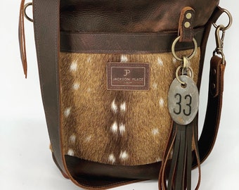 Jackson Place Collection - Axis Deer Hair-on-Hide Brown Small Leather Bucket - Bag Strap Purse Tote Handbag Cowhide Fur Gold Cow Tag Tassel
