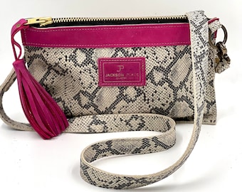 Snake Embossed Leather Crossbody Clutch: Pink Trim, Adjustable Strap