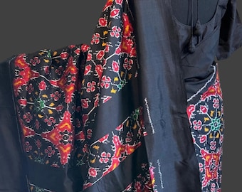 Black pure ikat silk saree with prestitched blouse pett border
