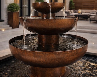 特注3段式コルテン鋼製噴水　夕暮れ時の静寂が庭を包み込む