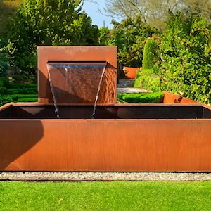 Sculpted Oasis Water Feature Modern Corten Steel for Outdoor Luxury