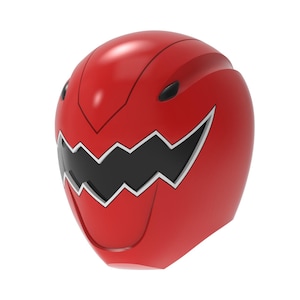 以下が含まれることがあります： 顔に黒と白のギザギザ模様が入った赤いヘルメット。ヘルメットは滑らかで光沢のある仕上がりで、流線型です。デザインは様式化された動物の顔に似ています。