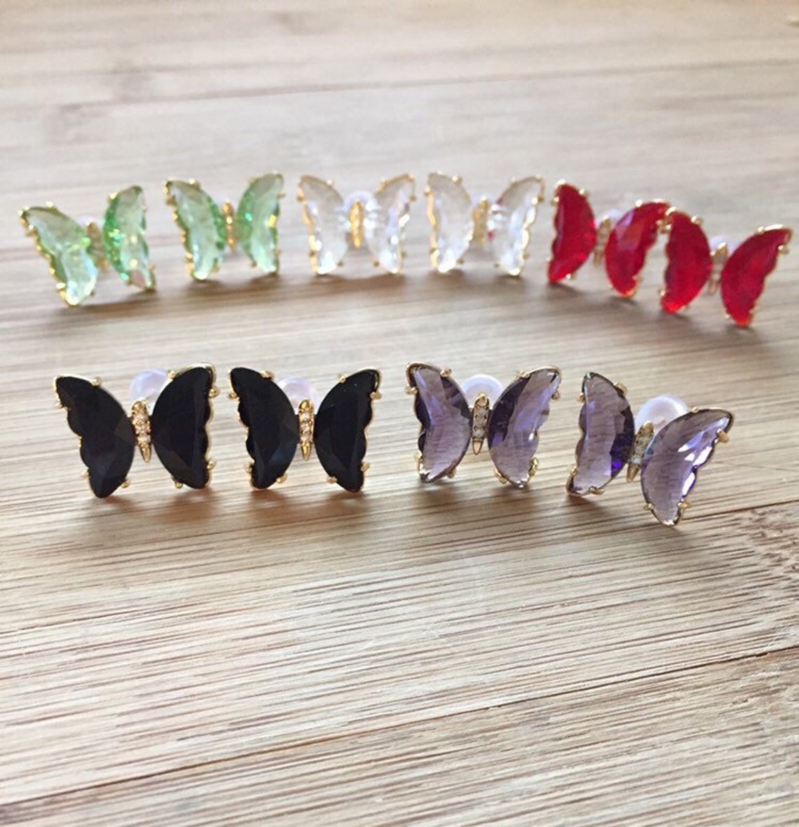 Crystal butterfly earring in multi colours. Gold plated. Etsy