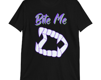 May include: Black t-shirt with the text "Bite Me" in purple and green lettering.  The shirt also features a graphic of white vampire fangs.