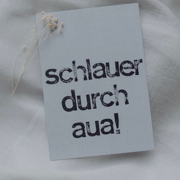 Postkarte gestempelt "Schlauer durch aua"