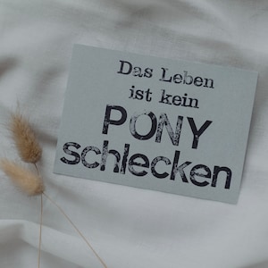 Postkarte "Ponyschlecken" gestempelter Spruch