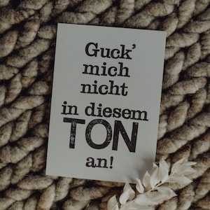 Postkarte "Ton angucken" gestempelter Spruch