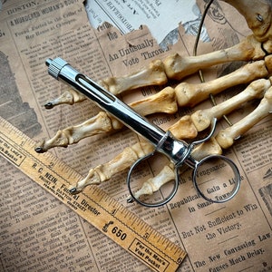 Aspirating Syringe
