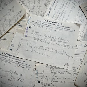 May include: A close-up of a vintage prescription for "Strych Sulph grn/40" written on a white paper with black ink. The prescription is dated September 25, 1903. The prescription is for "Mr. Oleman" and instructs to take "one tablet til bedtime".