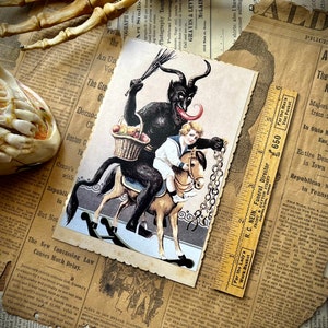 Cartão do gabinete vitoriano Krampus com fotografia de Natal