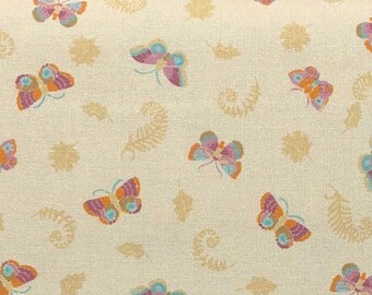 May include: A beige fabric with a repeating pattern of colorful butterflies and stylized leaves. The butterflies are in shades of pink, orange, and blue.