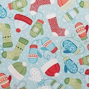 Christmas Fabric / 100% Quilter Cotton Fabric / Snow Mittens, Snow Cap, & Stocking on Blue / Winter Games 3535-24 / by Benartex / 44&quot; wide