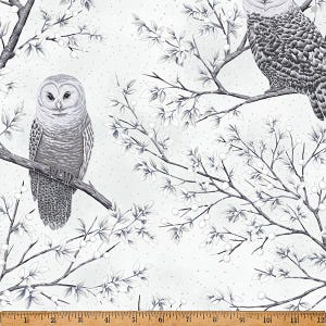 May include: A fabric featuring a repeating pattern of owls perched on tree branches. The owls are depicted in shades of gray and white, with detailed feather textures. The branches and leaves are also in gray and white, set against a light background.