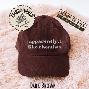 May include: A rustic wooden sign with the text "Welcome to our home" in white lettering. The sign features a distressed finish and a simple, inviting design, perfect for entryway decor.