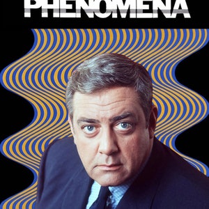 May include: A DVD cover featuring a man in a suit with the text "The Amazing World of Psychic Phenomena" and "Hosted by Raymond Burr".