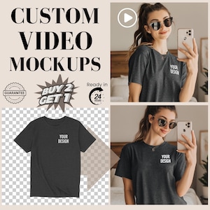 May include: A dark grey t-shirt with the text "YOUR DESIGN" in white. The image also includes the text "CUSTOM VIDEO MOCKUPS", "BUY 2 GET 1", and "Ready in 24 HOURS". A woman is wearing the t-shirt and holding a phone.