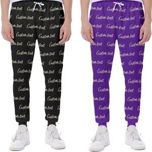 May include: Two pairs of sweatpants with a repeating pattern of the text "Custom text" in a light gold color. One pair is black and the other is purple.