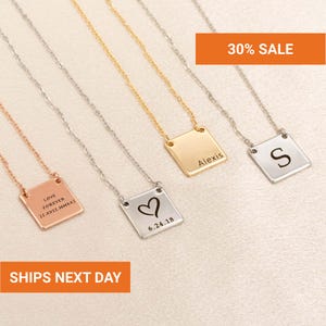 May include: Several square pendant necklaces in rose gold, silver, and gold. Each necklace has a fine chain and a square pendant with personalized engravings, such as a heart, initials, and dates. The image also includes the text "30% SALE".