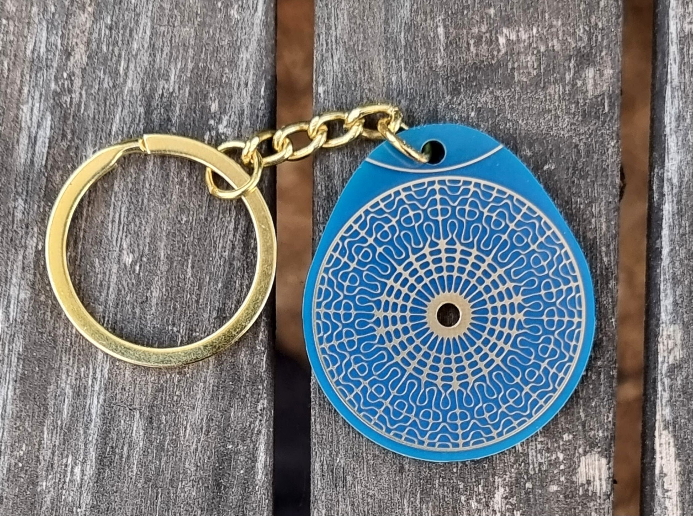 Cymatic key ring 429.62 Hz quantum resonance of the water molecule