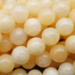yellow calcite 22 to 60 natural beads 6 and 8mm