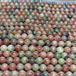 Malaya-Granat (grüner und orangefarbener Granat) 22 bis 60 Naturperlen 6 mm und 8 mm