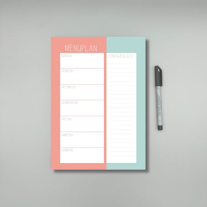 May include: A pink and blue dry erase board with the words "MEN&Uuml;PLAN" and "EINKAUFLISTE" written on it. The board is divided into two sections, one for a meal plan and one for a shopping list. There are lines for writing on both sections.