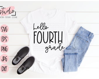 May include: White t-shirt with black text that reads "hello fourth grade". The shirt is on a white wooden surface with a pair of black slip-on shoes and blue jeans.