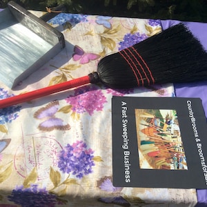 Black Corn Broom with a solid wooden-handle painted red full size traditional broom 100% broomcorn used.