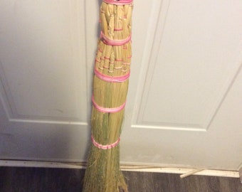 Pink jump the broom wedding item