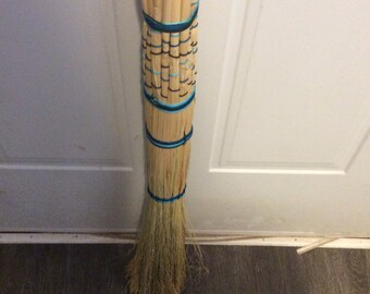 Jump the broom! Blue colored accent string broom