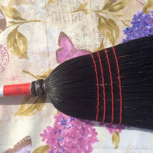 Black Corn Broom with a solid wooden-handle painted white full size traditional broom 100% broomcorn used.