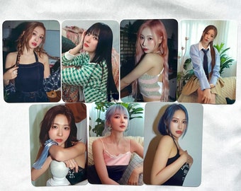 May include: A set of 8 photo cards featuring different women with various hairstyles and clothing. The cards are printed on a white background and have a glossy finish.