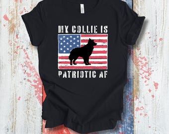 May include: Black t-shirt with a graphic of a Collie dog silhouette in front of an American flag design. The text "MY COLLIE IS PATRIOTIC AF" is printed above and below the flag graphic. The shirt is made of a soft material.