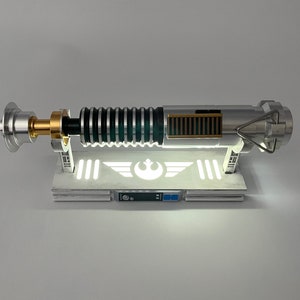 Rebel X-Wing Pilot Inspired Lightsaber Display Stand With LED Light
