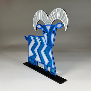 Suncatcher of the Mary Blair five legged goat from Contemporary Resort at Walt Disney World