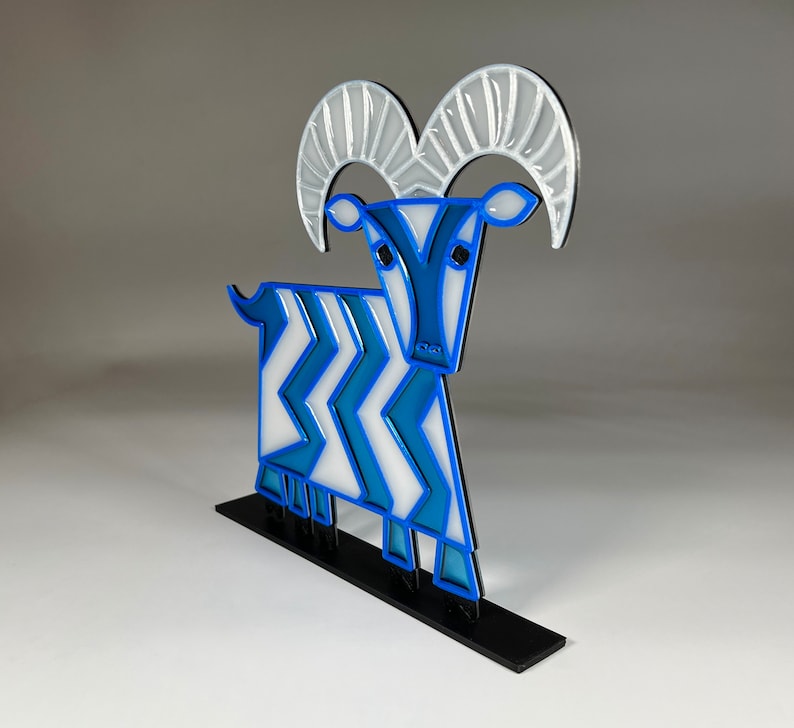 Suncatcher of the Mary Blair five legged goat from Contemporary Resort at Walt Disney World