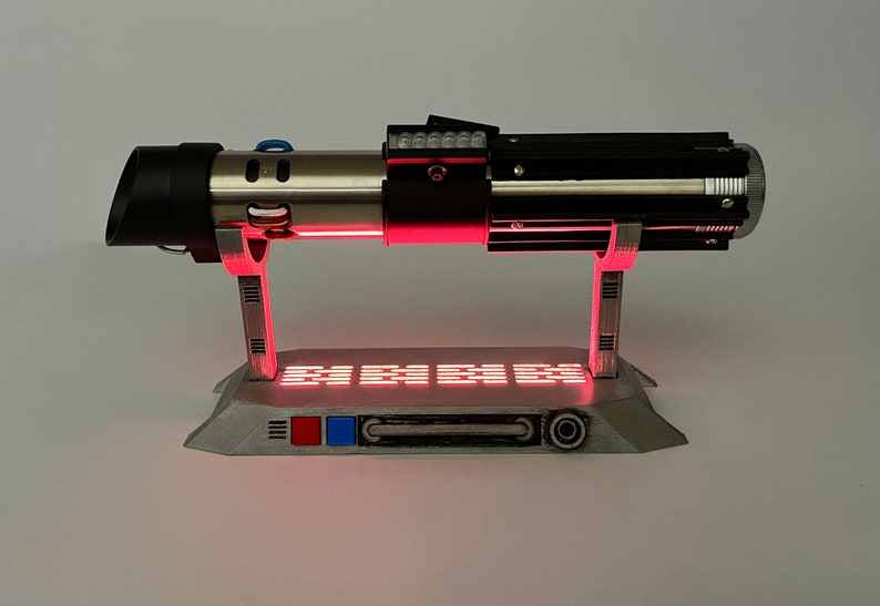 Light up Star Wars lightsaber display stand with red LED lighting