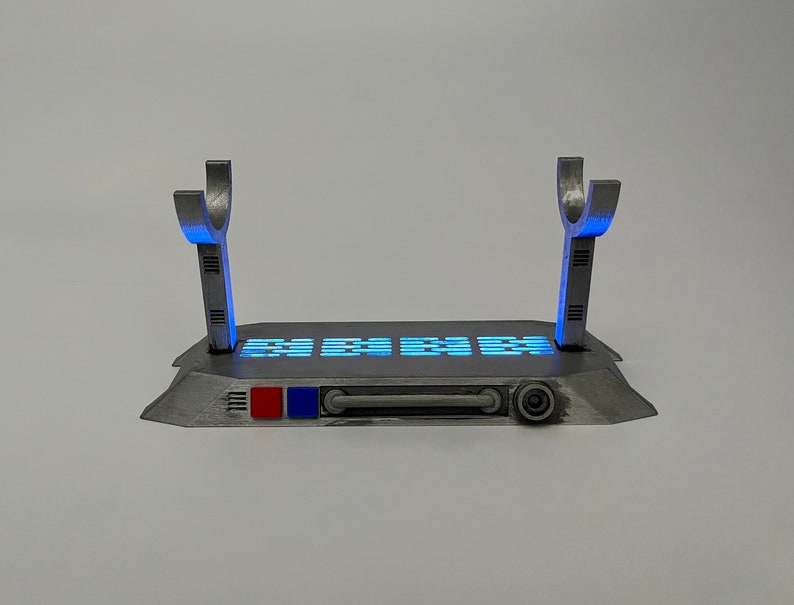 Light up Star Wars lightsaber display stand with blue lighting