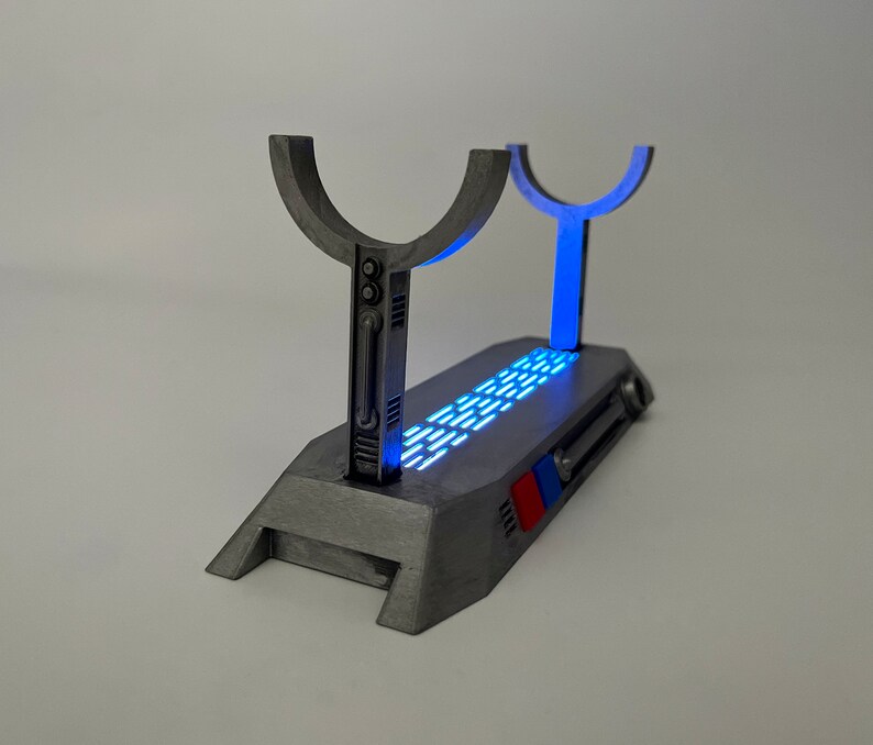 Light up Star Wars lightsaber display stand with blue lighting