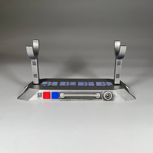 Light up Star Wars lightsaber display stand with blue lighting
