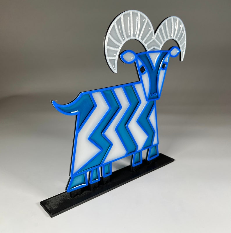 Suncatcher of the Mary Blair five legged goat from Contemporary Resort at Walt Disney World