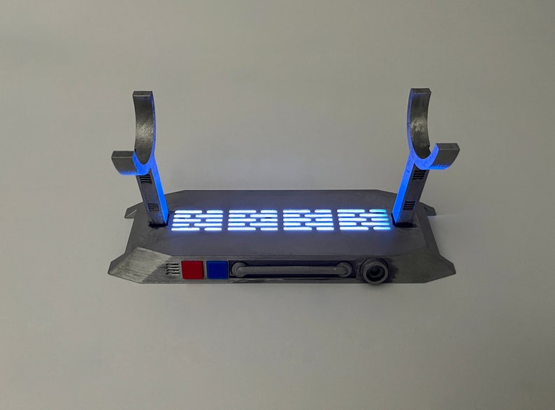 Light up Star Wars lightsaber display stand with blue lighting