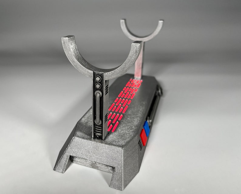Light up Star Wars lightsaber display stand with red LED lighting