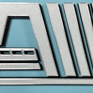 May include: A silver metal logo featuring a stylised train and the words "Walt Disney World" in black lettering.
